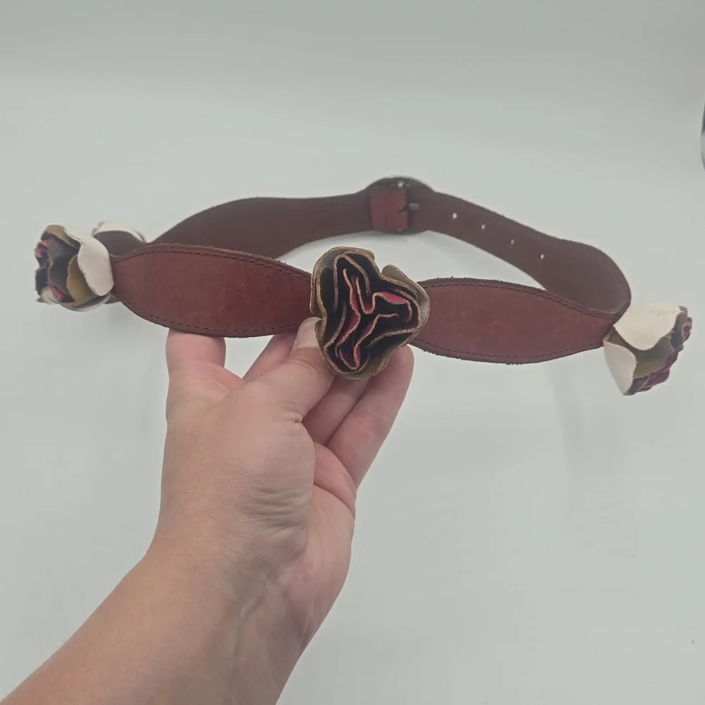 Anthropologie Lucky Penny 3d flowers brass oval buckle leather belt